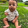Haelo is registered to the contest to win money with this photo: baby, child, grass, outdoor, curious, sitting, greenery, cute, portrait, expression, shirt, button_up, feet, toes, nature, young, person, face, wide_eyes, casual_clothing
