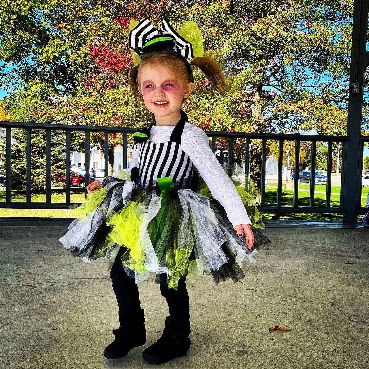Alivia is registered to the contest to win money with this photo: boot, costume, costume_hat, event, eyewear, fashion_accessory, fashion_design, fence, formal_wear, fun, grass, happy, hat, joy, leisure, people_in_nature, person, personal_protective_equipment, plant, shoe