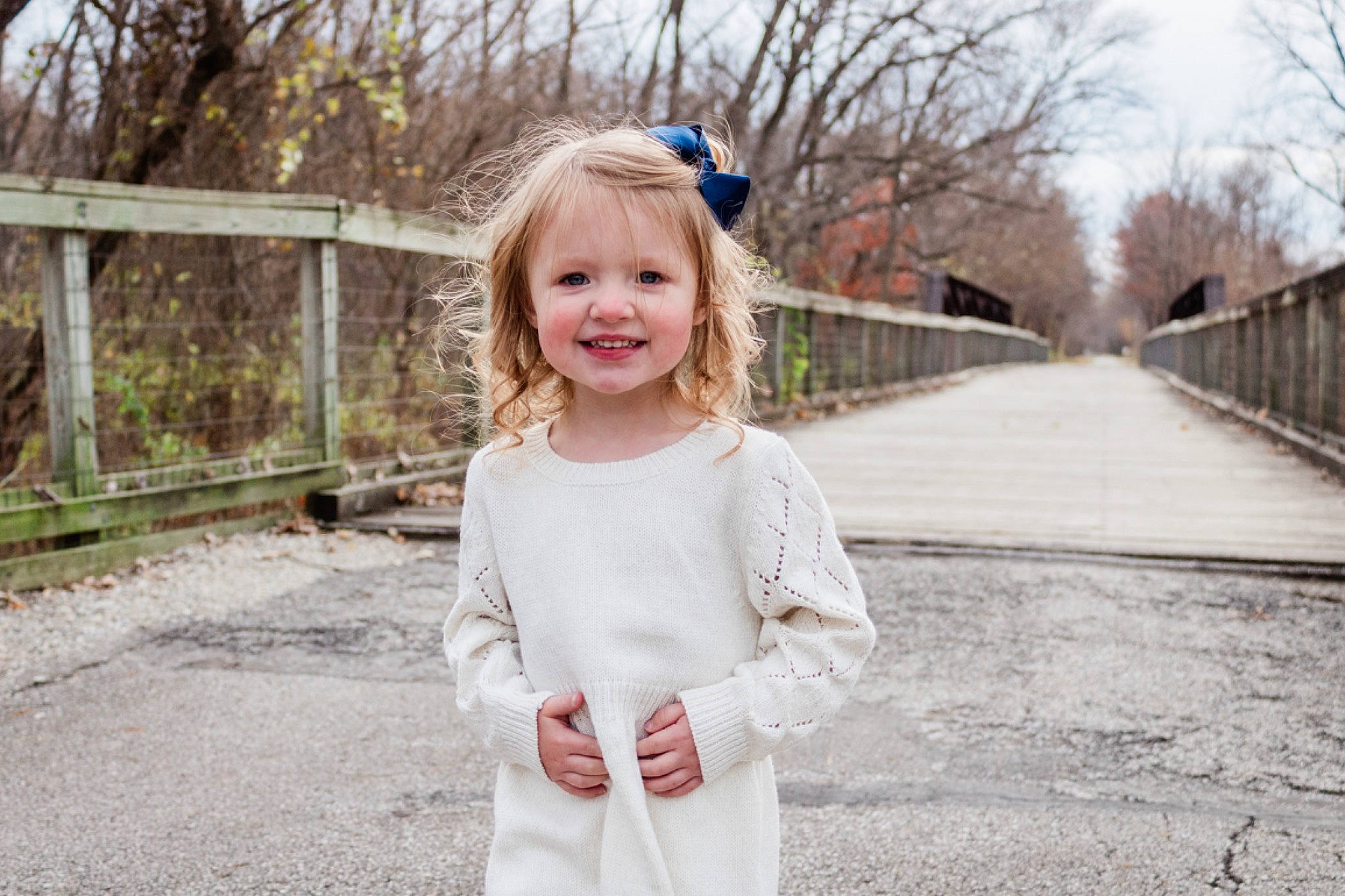 Alivia is registered to the contest to win money with this photo: asphalt, blond, child, dress, face, fun, grass, happy, hat, joy, pattern, person, plant, recreation, road, shoulder, sleeve, smile, sunglasses, toddler