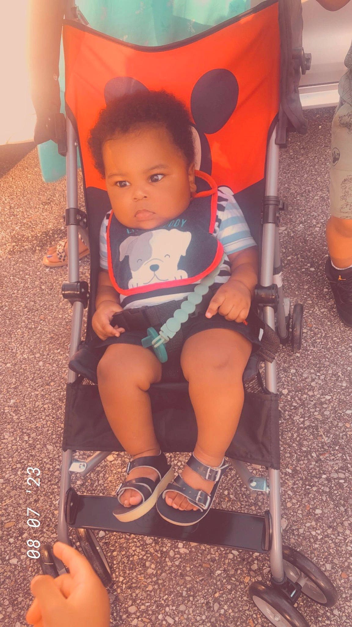 Bro Drick joined the competition — help win amazing prizes! baby, baby_carriage, baby_products, chair, child, foot, fun, human_leg, lap, leg, leisure, orange, person, sandal, shoe, sitting, sneakers, thigh, tints_and_shades, toddler