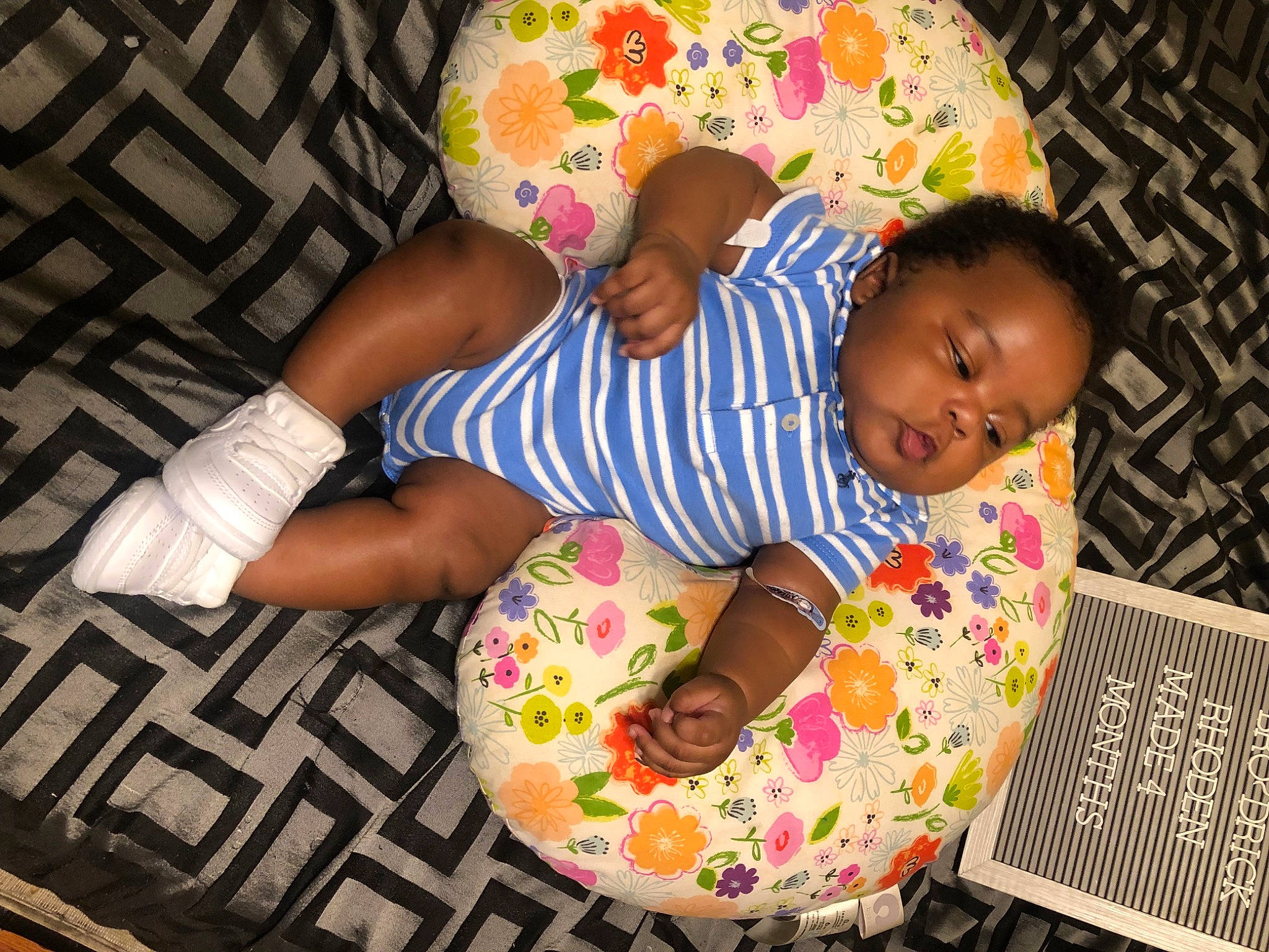 Bro Drick joined the competition — help win amazing prizes! baby, baby_products, baby_toddler_clothing, bedtime, child, comfort, event, flooring, fun, happy, head, linens, pattern, person, pink, play, room, sitting, t_shirt, textile
