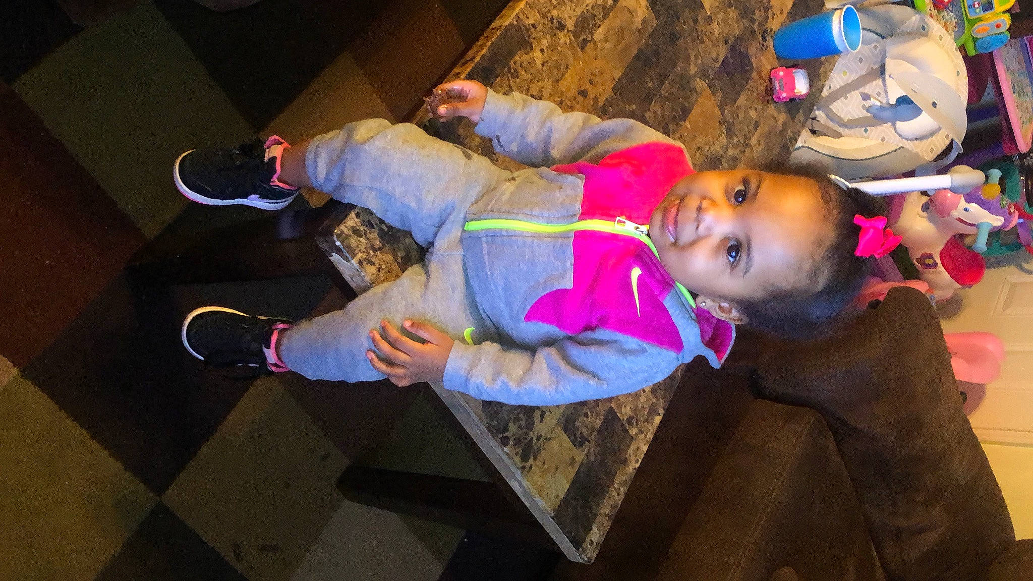 Avaughni is registered to the contest to win money with this photo: baby, child, event, fun, happy, hat, leisure, magenta, person, room, smile, toddler, tree