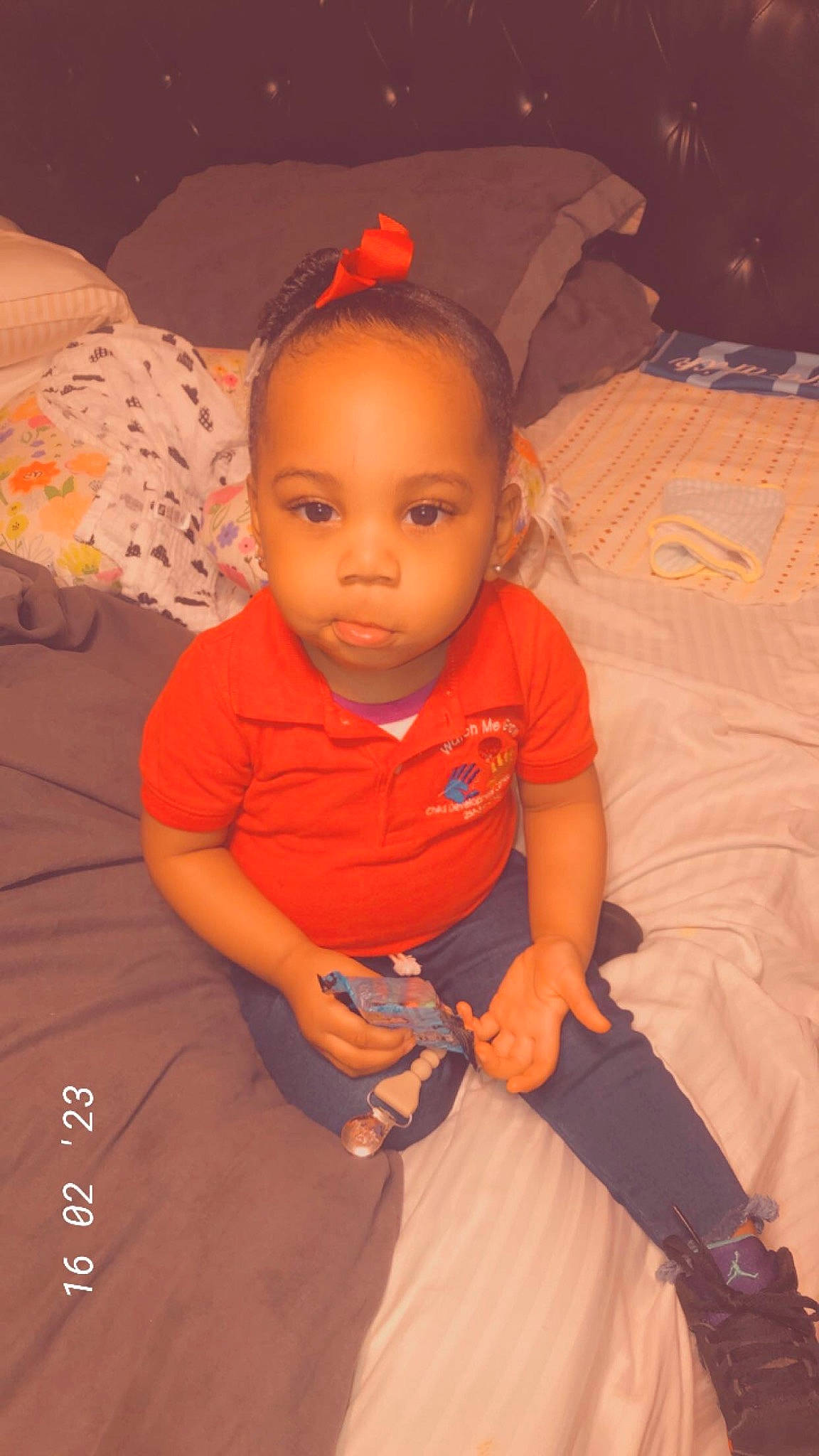 Avaughni joined the competition — help win amazing prizes! baby, baby_toddler_clothing, cheek, child, flooring, fun, happy, human_body, iris, nose, orange, peach, person, pink, room, sitting, skin, sleeve, t_shirt, thumb