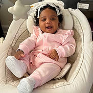 Demoni Otey joined the competition — help win amazing prizes! baby, baby_shoes, bouncer, bow, bracelet, child, cozy, curly_hair, cute, hanging_star, happy, headband, indoor, infant, mobile, onesie, pink_clothes, portrait, seat, smile