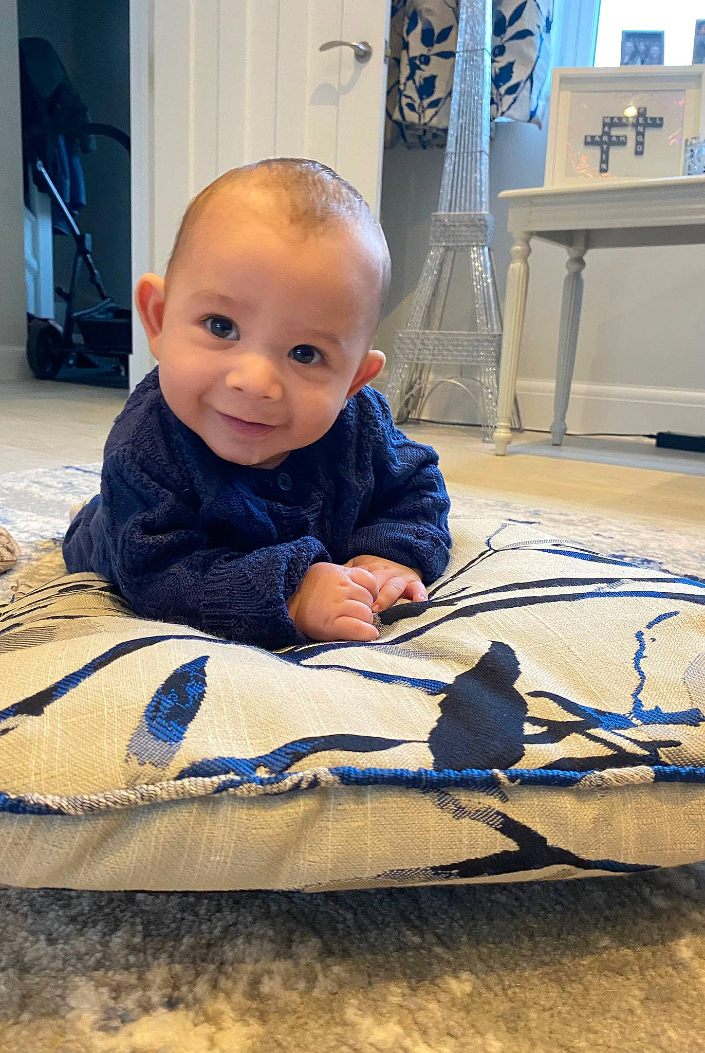 Kamden joined the competition — help win amazing prizes! azure, baby, baby_toddler_clothing, child, comfort, electric_blue, floor, flooring, fun, hairstyle, happy, human_body, human_leg, joy, person, sitting, skin, smile, standing, tints_and_shades