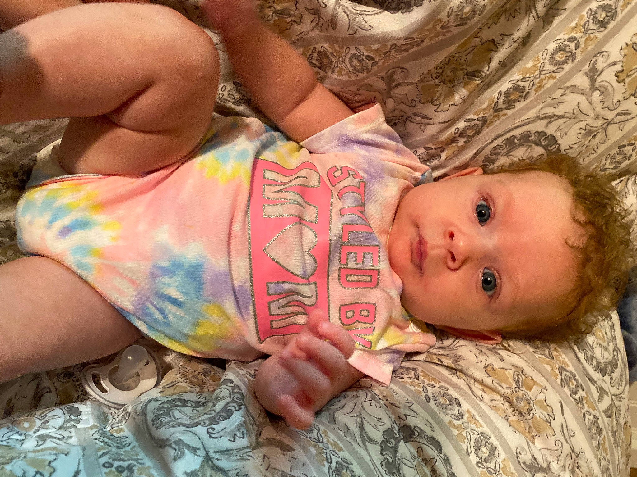 Zerenity is registered to the contest to win money with this photo: baby, cheek, chest, child, elbow, eye, finger, happy, human_body, human_leg, mouth, nose, pattern, person, skin, temporary_tattoo, thigh, toddler, trunk, wood