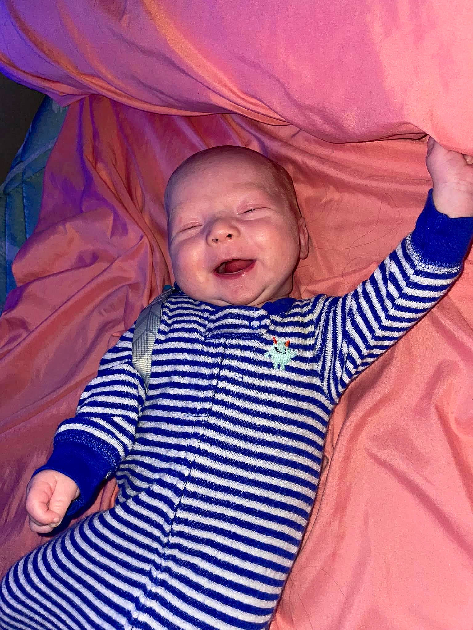 Tanner joined the competition — help win amazing prizes! baby, baby_toddler_clothing, child, comfort, eye, facial_expression, finger, fun, gesture, happy, head, human_body, linens, mouth, nose, outerwear, person, skin, sleeve, smile