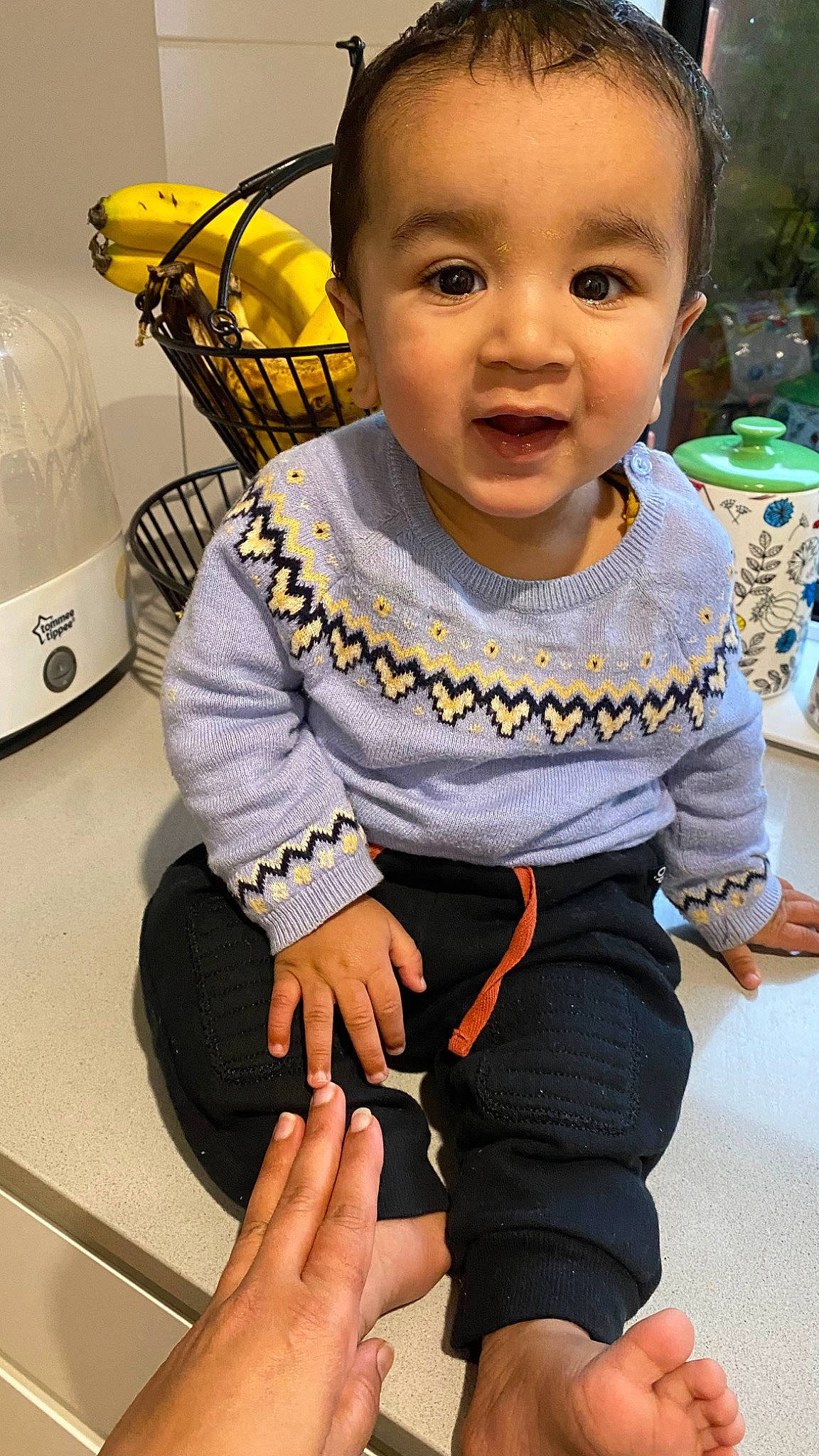 Gunav is registered to the contest to win money with this photo: baby, baby_products, baby_toddler_clothing, chair, cheek, child, eye, finger, flooring, happy, human_leg, iris, knee, person, sitting, skin, sleeve, smile, t_shirt, thigh