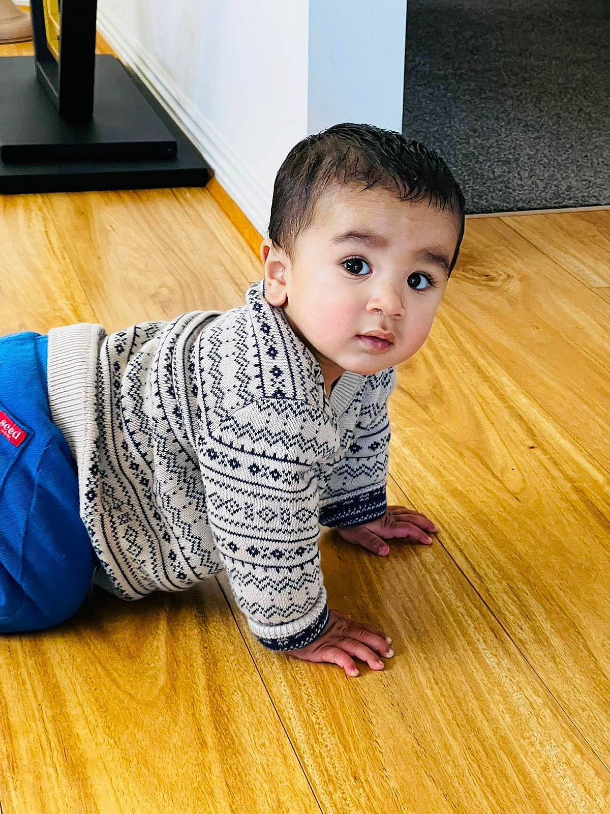 Gunav joined the competition — help win amazing prizes! baby, baby_toddler_clothing, child, crawling, elbow, floor, flooring, happy, hardwood, laminate_flooring, nose, pattern, person, skin, sleeve, standing, surprise, t_shirt, toddler, varnish