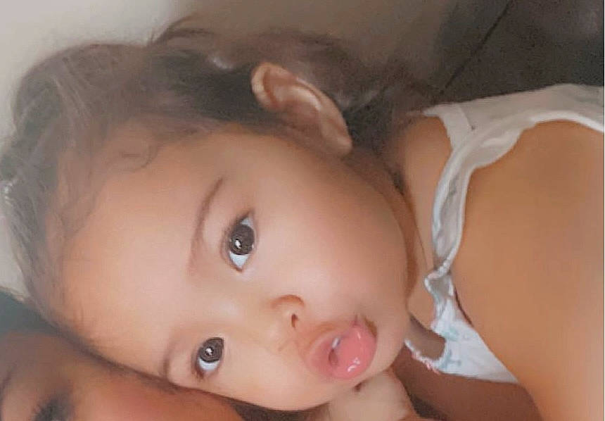 Zaniyah is registered to the contest to win money with this photo: arm, baby, black_hair, blurred, cheek, chest, ear, eyebrow, eyelash, gesture, hair, happy, human_body, iris, lip, neck, nose, person, skin, smile