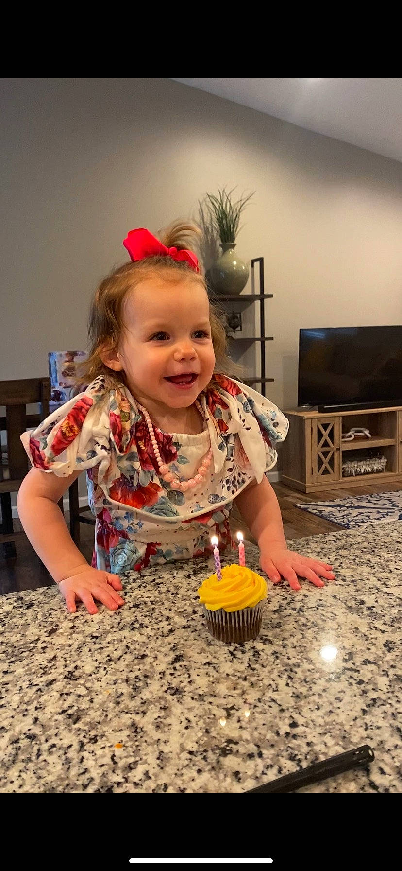 Chandler is registered to the contest to win money with this photo: baby, birthday, child, event, flooring, food, fun, happy, headpiece, holiday, home_appliance, joy, party_supply, person, play, smile, soil, sweetness, television, television_set