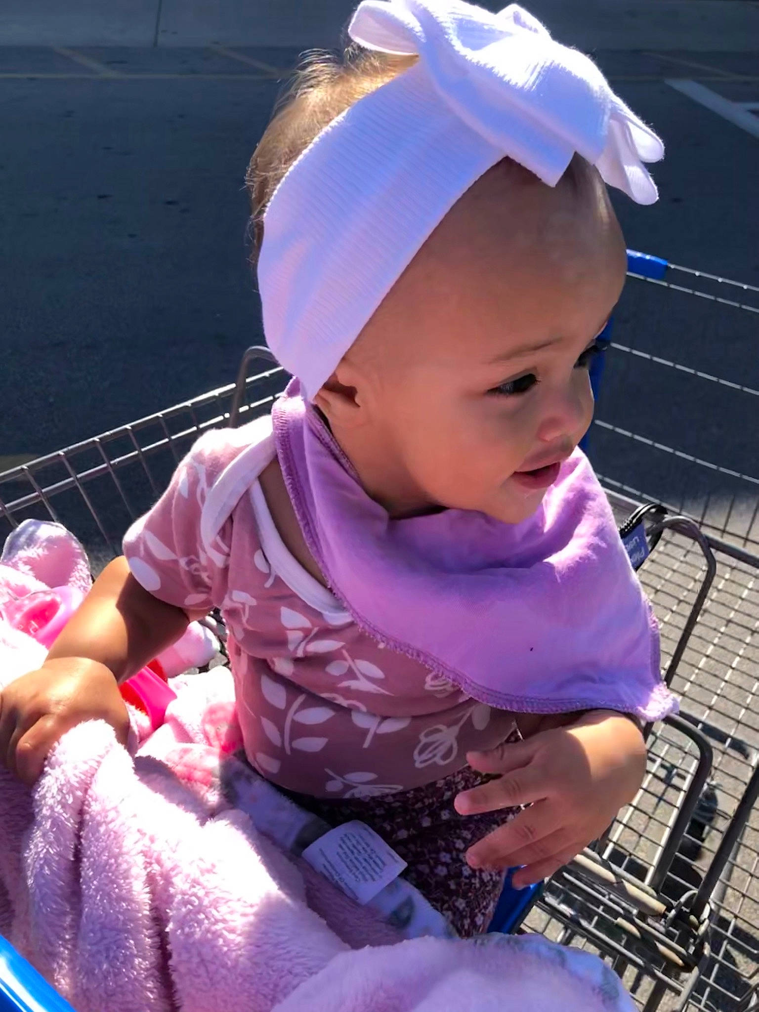 Cora joined the competition — help win amazing prizes! baby, baby_products, baby_toddler_clothing, blue, cap, child, electric_blue, fashion_accessory, fun, happy, magenta, person, personal_protective_equipment, pink, purple, recreation, skin, smile, toddler, vacation