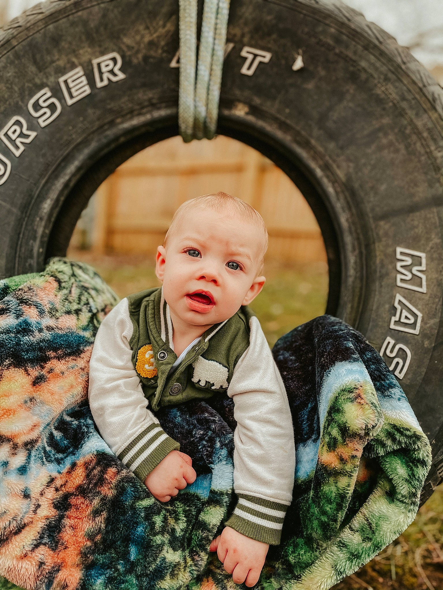 Mason joined the competition — help win amazing prizes! army, automotive_tire, automotive_wheel_system, camouflage, flash_photography, grass, jacket, marines, military, military_camouflage, military_person, military_uniform, pattern, person, sleeve, soldier, synthetic_rubber, tire, toddler, tread