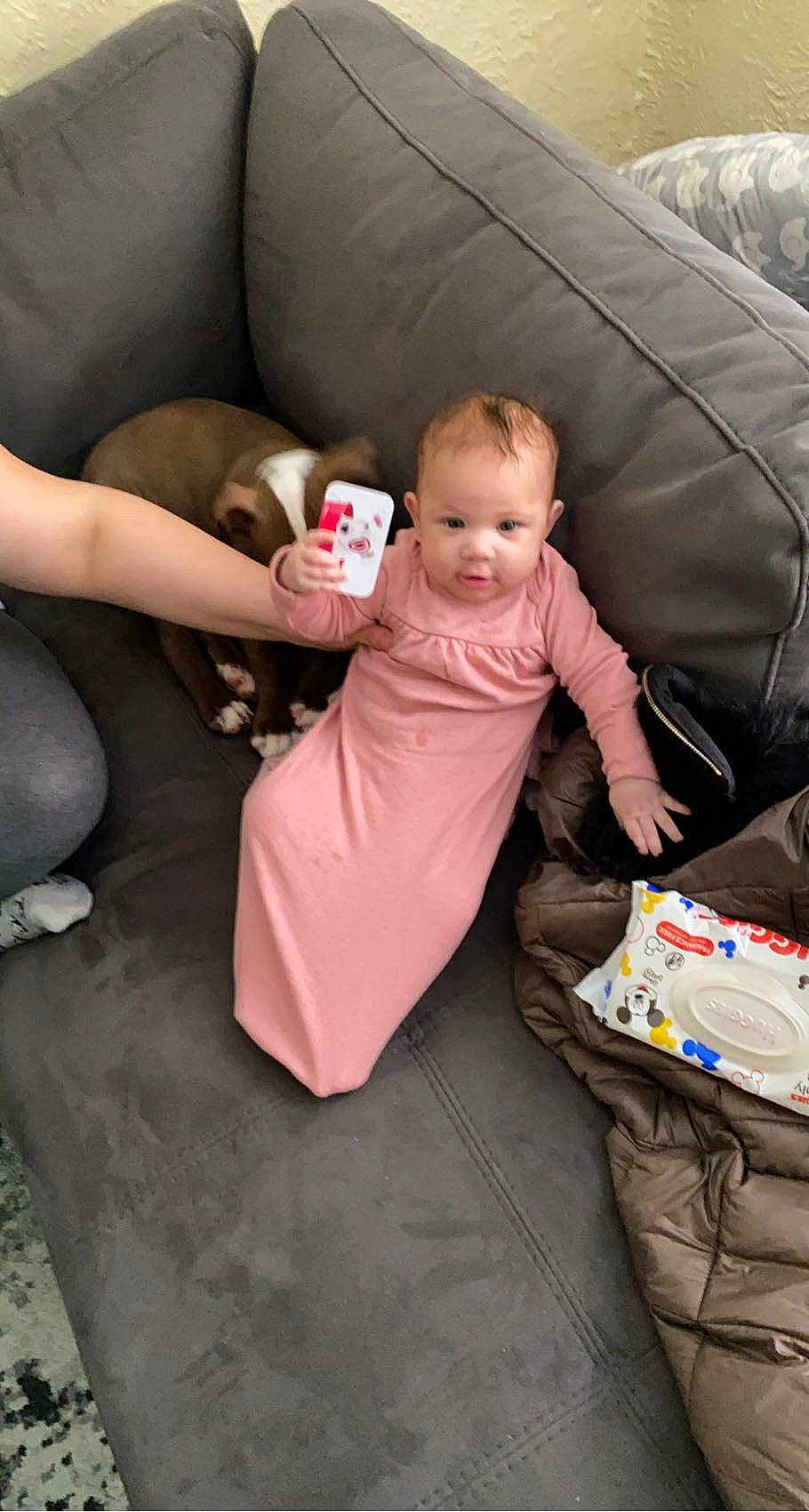 Ciara joined the competition — help win amazing prizes! baby, bag, box, child, comfort, flooring, foot, fun, human_body, human_leg, knee, lap, leisure, luggage_and_bags, person, plastic_bag, product, sitting, tent, thigh