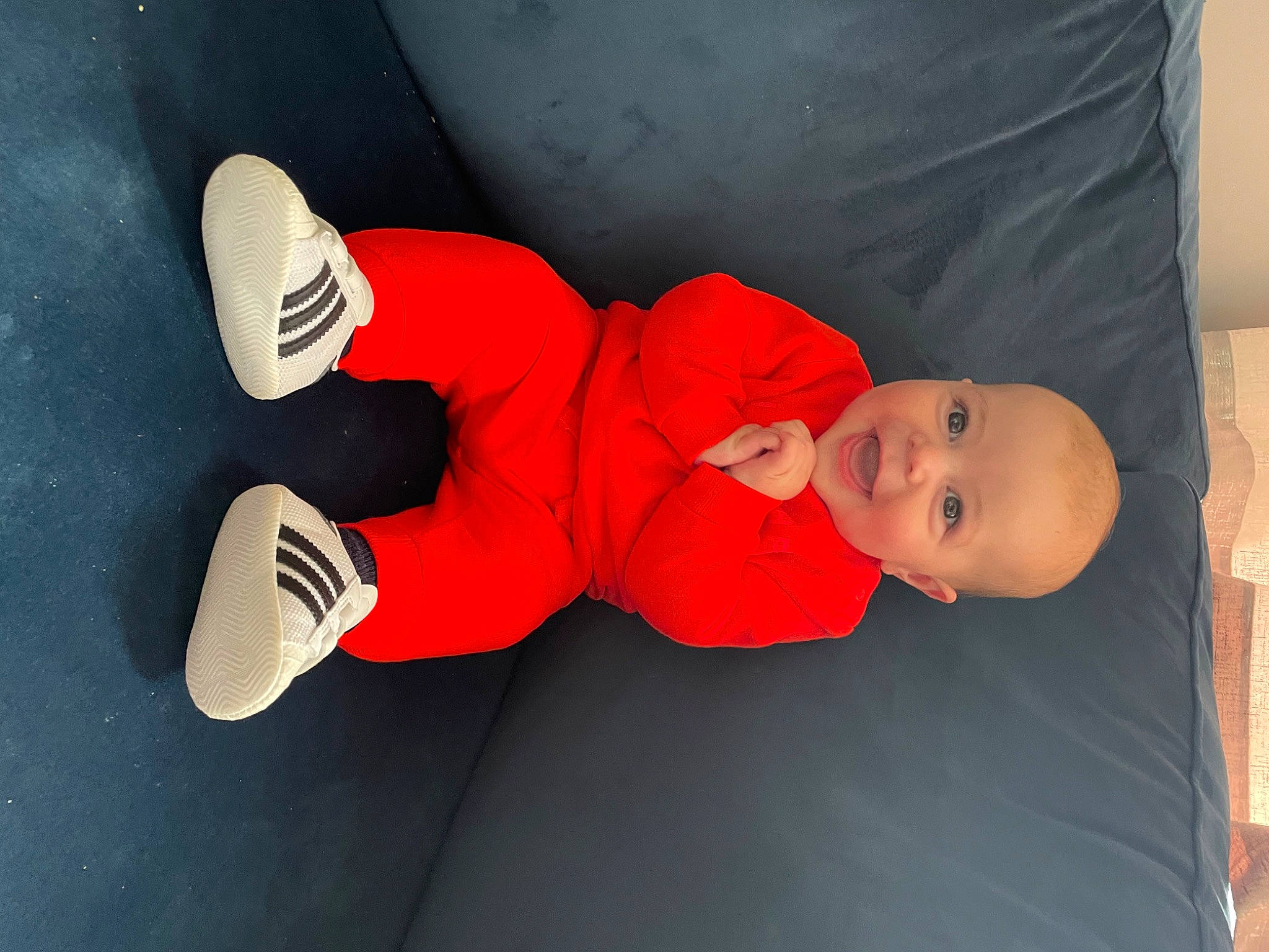 Hugo joined the competition — help win amazing prizes! baby, baby_products, baby_toddler_clothing, carmine, child, comfort, elbow, finger, fun, gesture, happy, hat, human_leg, person, room, sleeve, smile, t_shirt, thumb, toddler