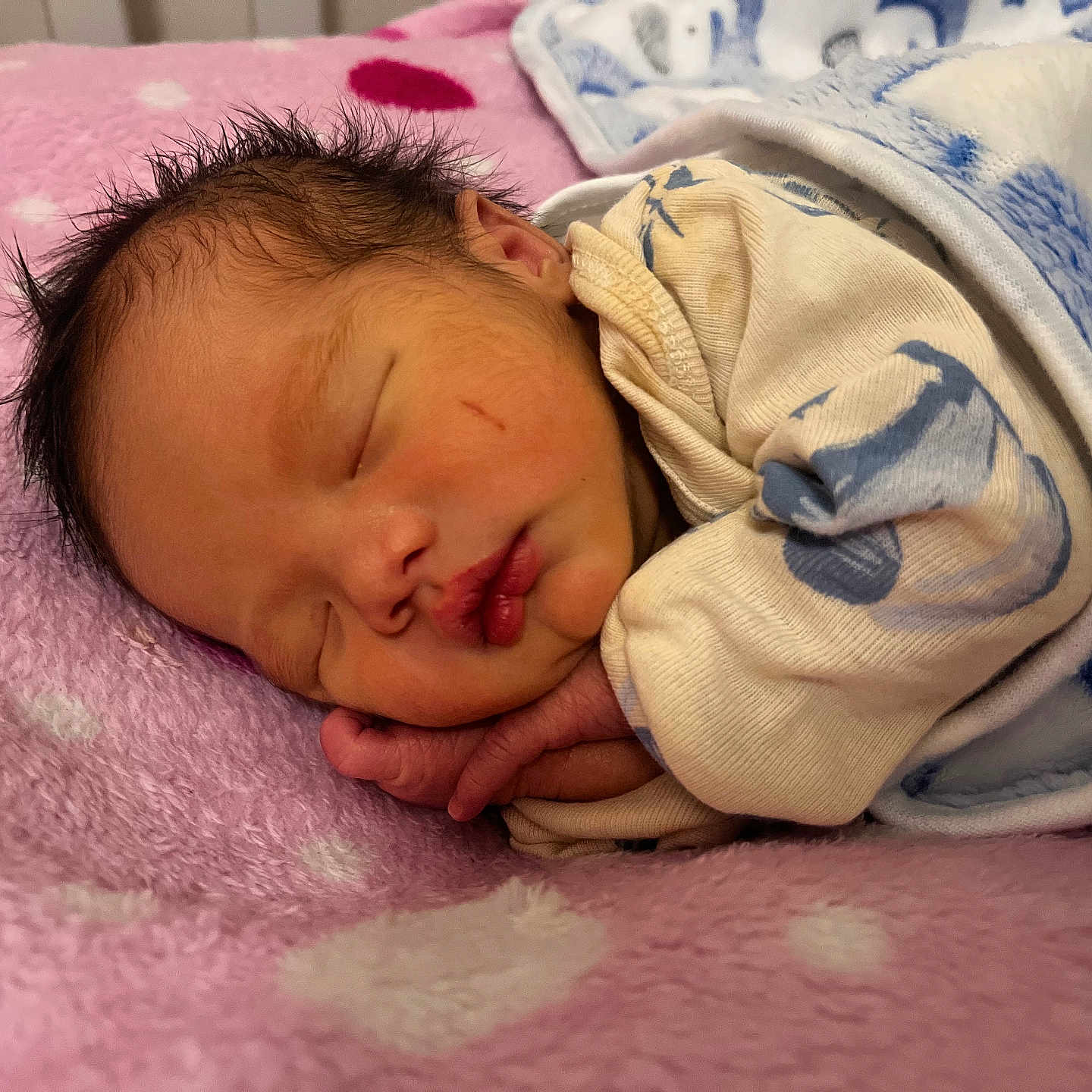 Xev Paculanan joined the competition — help win amazing prizes! baby, blanket, blue, child, clothing, cozy, cute, face, hand, indoors, infant, newborn, peaceful, pink, polka_dots, portrait, resting, sleeping, soft, wrapped