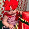 Emily Sophia joined the competition — help win amazing prizes! baby, child, red_bow, watermelon, watermelon_cake, patterned_background, summer, cute, chubby_cheeks, dress, star_pattern, food, celebration, portrait, infant, hand, table, fruit, closeup, indoor