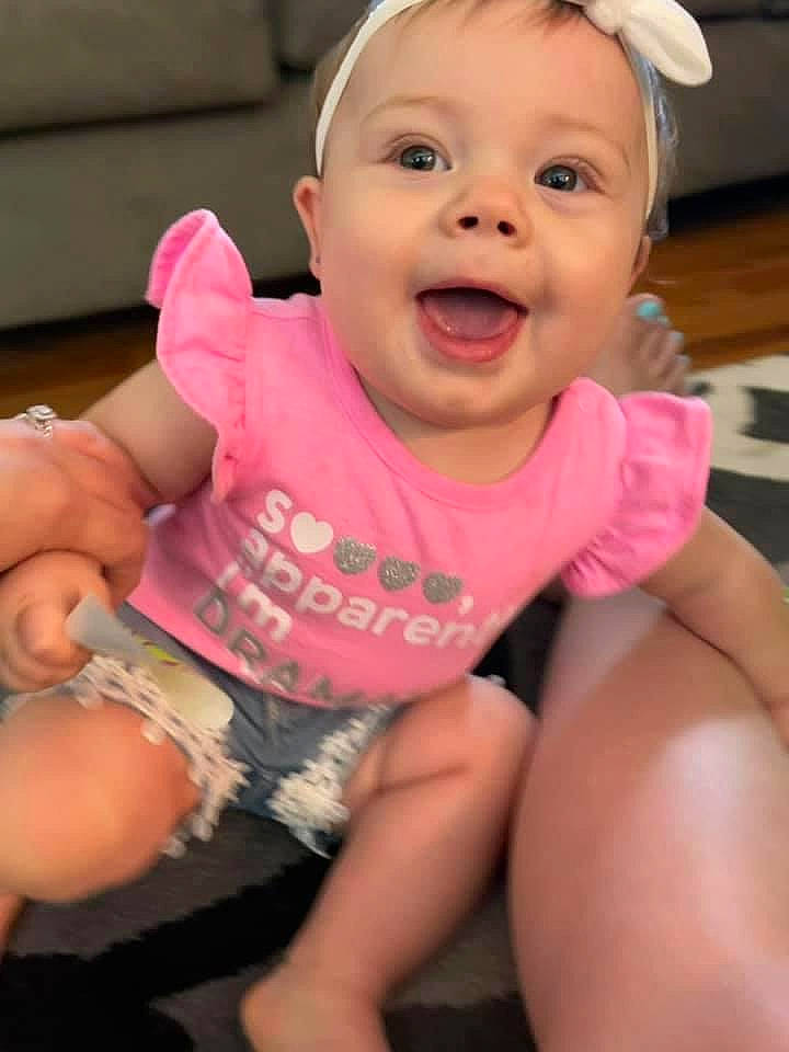 Brooklyn joined the competition — help win amazing prizes! baby_toddler_clothing, cheek, chin, ear, eye, face, gesture, hand, happy, head, leg, lip, mouth, muscle, neck, nose, person, pink, skin, sleeve