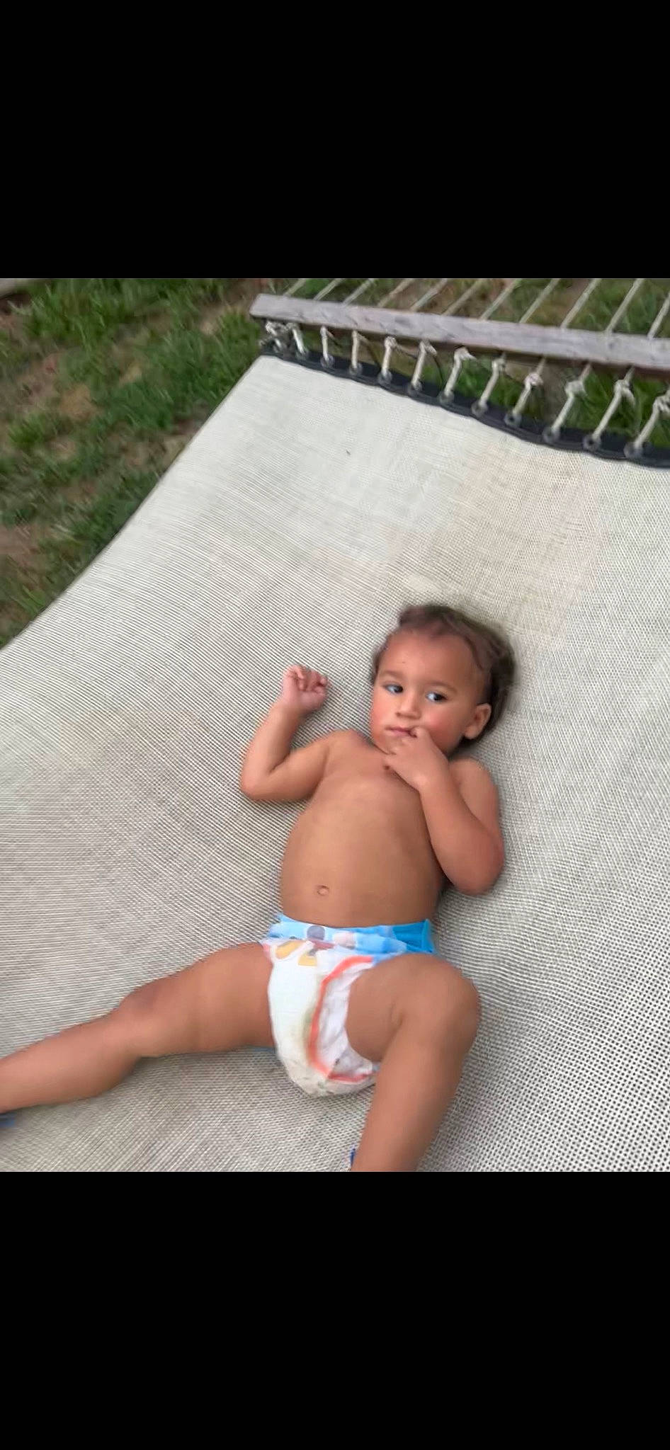 Traycen joined the competition — help win amazing prizes! baby, barefoot, chest, comfort, diaper, fun, grass, human_body, knee, leisure, muscle, outdoor_furniture, person, skin, stomach, textile, thigh, toddler, trunk, undergarment