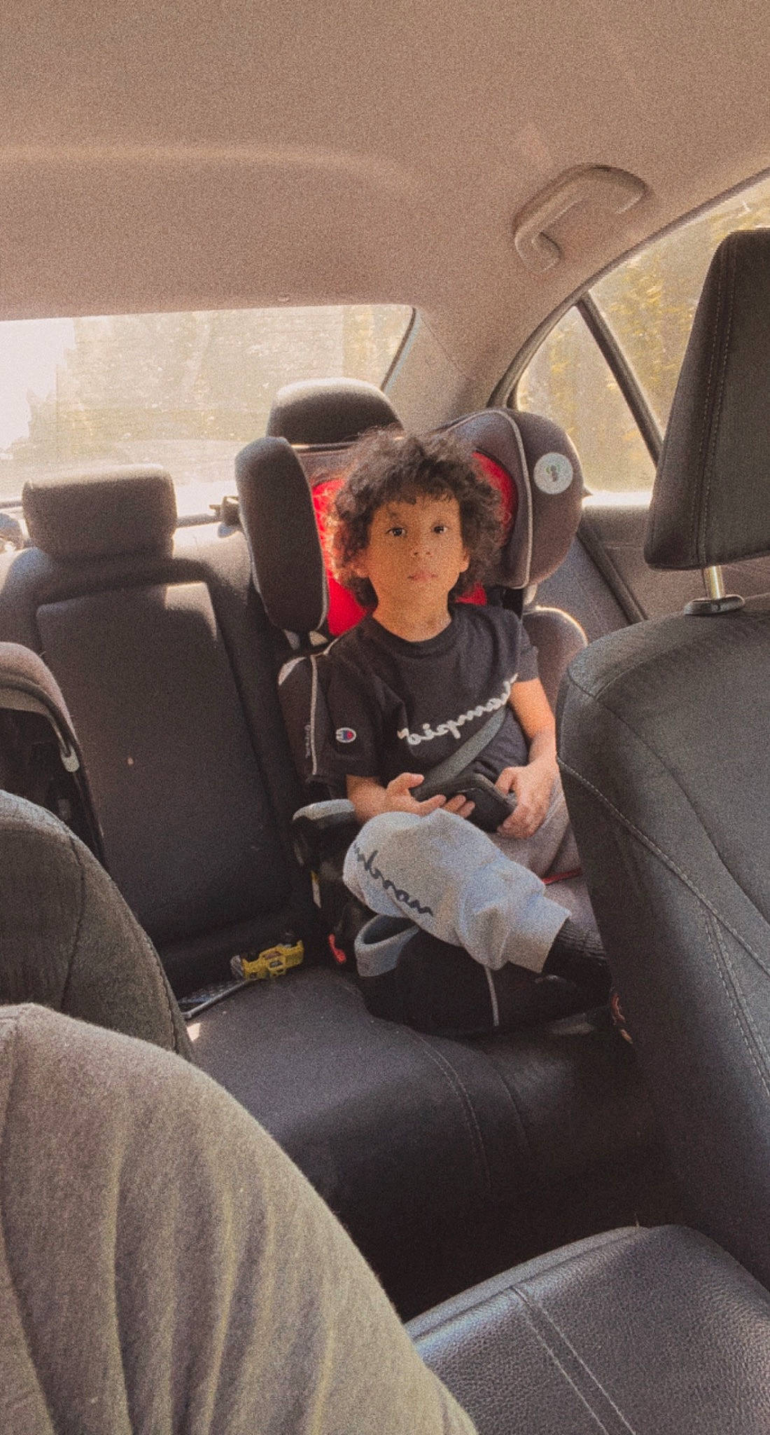 Taivon is registered to the contest to win money with this photo: auto_part, automotive_design, automotive_exterior, car, car_seat, car_seat_cover, comfort, head_restraint, land_vehicle, mode_of_transport, motor_vehicle, person, personal_luxury_car, plant, seat_belt, steering_part, steering_wheel, tints_and_shades, vehicle, vehicle_door