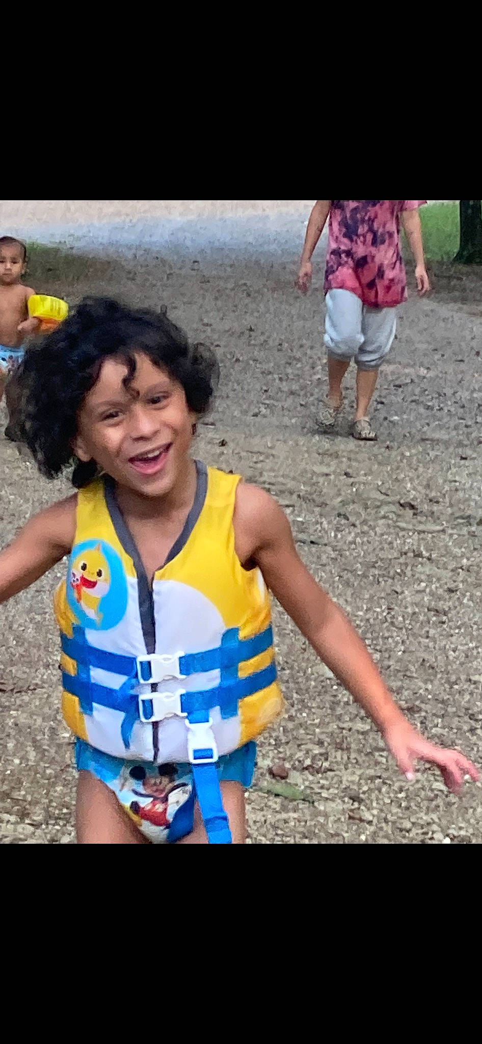 Taivon is registered to the contest to win money with this photo: adaptation, child, electric_blue, event, fun, gesture, happy, human_leg, jewellery, leisure, person, photograph, shorts, smile, snapshot, soil, summer, t_shirt, thigh, travel