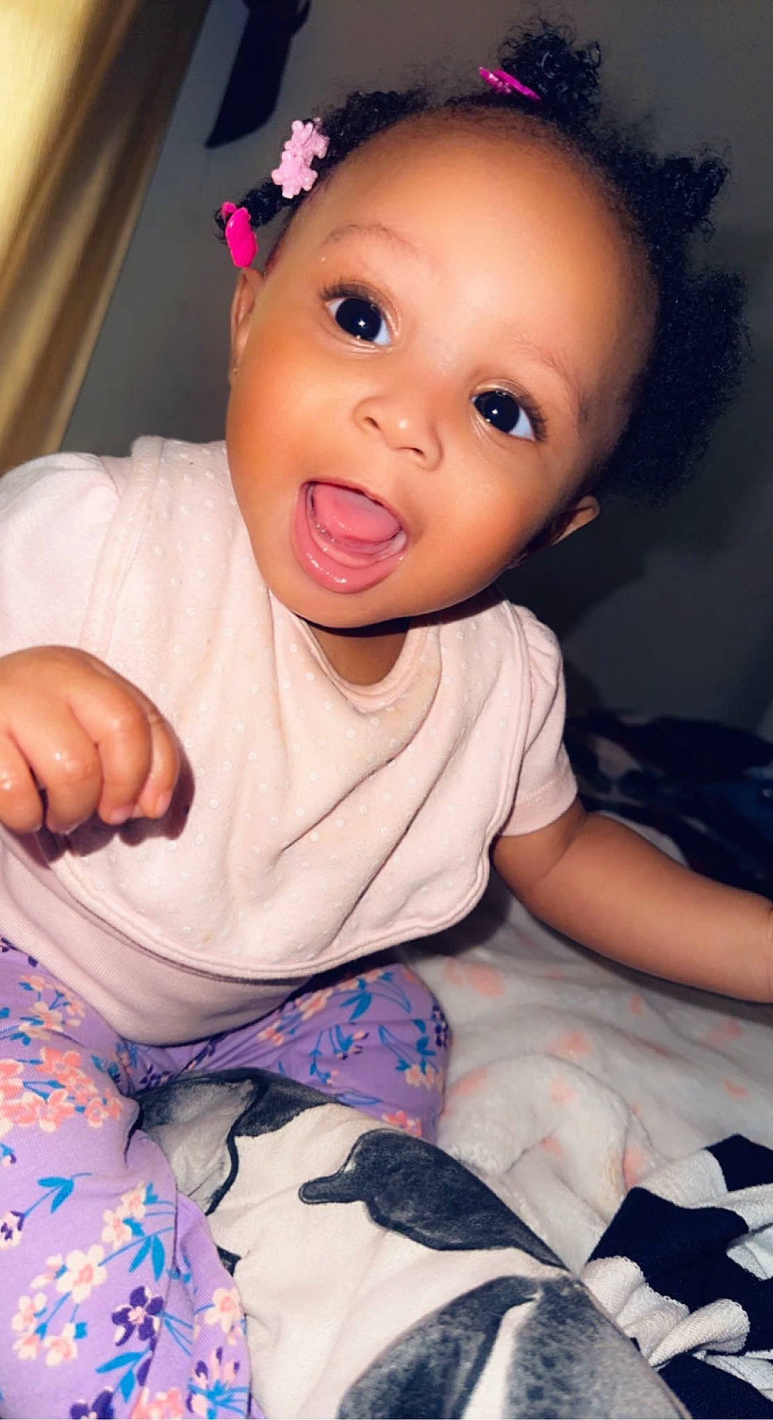 Malia joined the competition — help win amazing prizes! baby, baby_toddler_clothing, cheek, child, comfort, eyelash, fashion_accessory, flash_photography, fun, happy, hat, iris, lip, person, petal, pink, skin, sleeve, smile, surprise