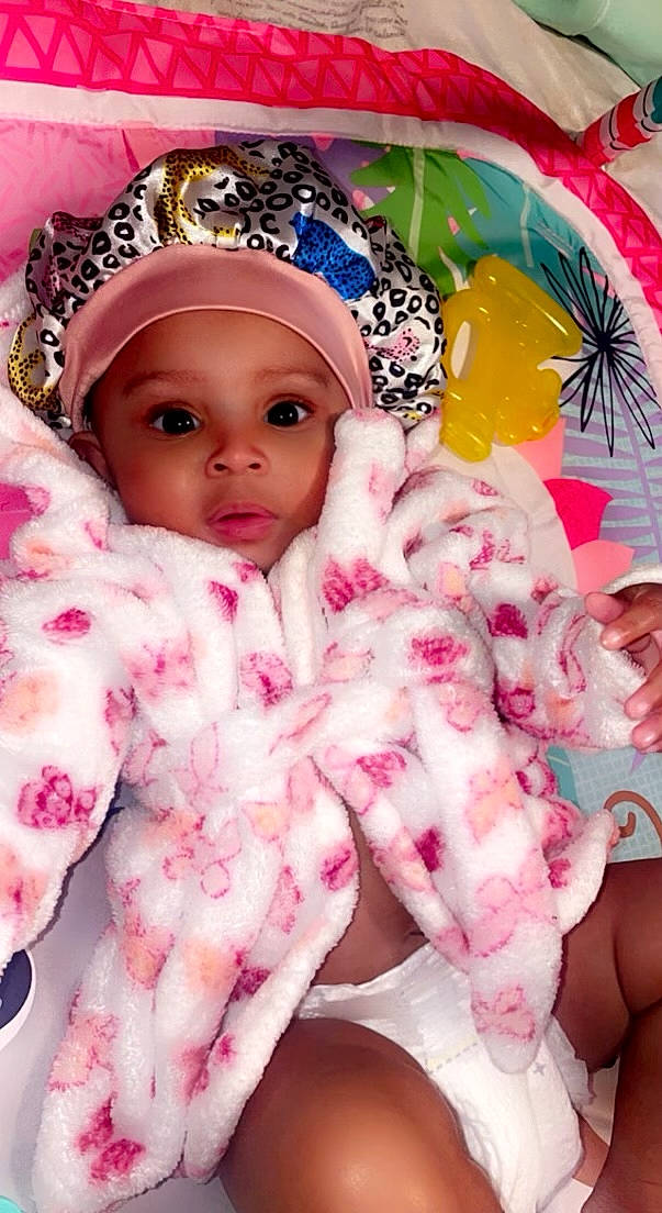 Malia Mae joined the competition — help win amazing prizes! baby, baby_toddler_clothing, cheek, child, eyelash, fashion_accessory, fur, happy, headwear, human, magenta, nail, pattern, peach, person, petal, photomontage, pink, skin, textile