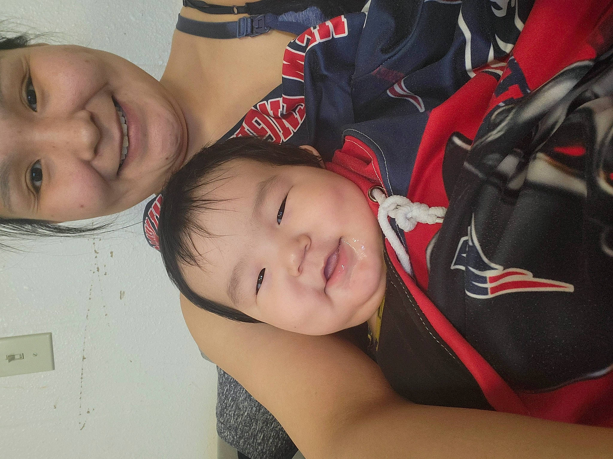 Peter is registered to the contest to win money with this photo: cheek, child, eye, eyebrow, fun, gesture, grass, happy, headwear, human_body, joy, leisure, lip, mouth, neck, nose, person, plant, red, skin