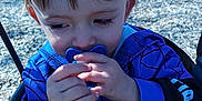 Charles joined the competition — help win amazing prizes! toddler, child, pacifier, blue_hoodie, spiderman, swing, blanket, outdoor, playground, daylight, face, hands, cute, young_child, clothing, person, nature, wood_chips, smiling, happy