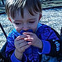 toddler, child, pacifier, blue_hoodie, spiderman, swing, blanket, outdoor, playground, daylight, face, hands, cute, young_child, clothing, person, nature, wood_chips, smiling, happy