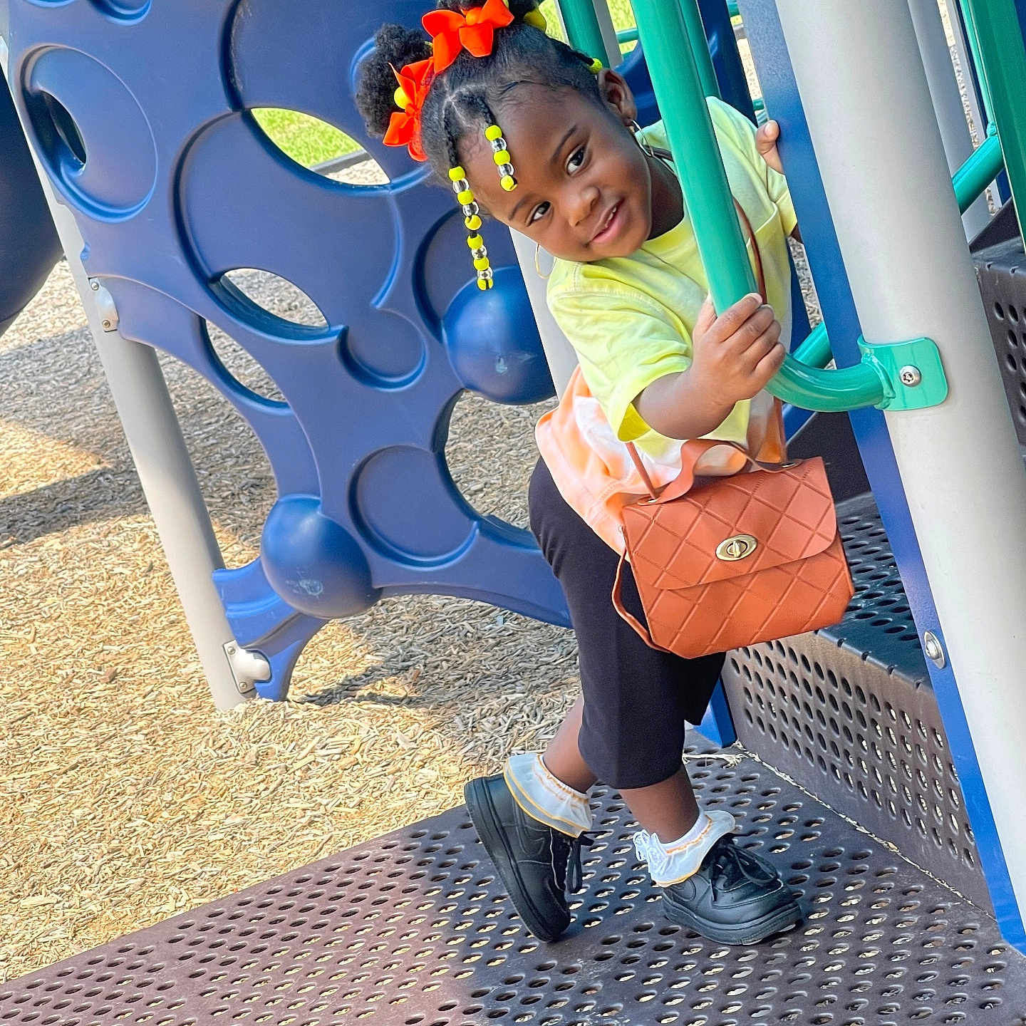 Azari is registered to the contest to win money with this photo: accessories, bag, child, clothing, face, female, footwear, girl, grass, handbag, head, nature, outdoorplayarea, outdoors, person, photography, play, playarea, portrait, shoe