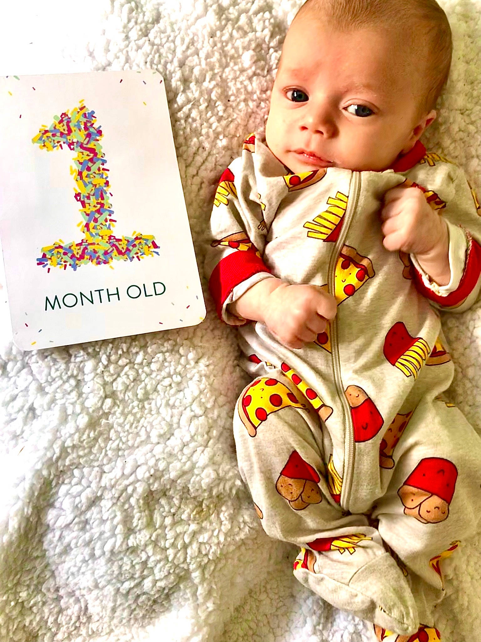 Eoghan joined the competition — help win amazing prizes! arm, baby, baby_products, baby_toddler_clothing, cheek, child, finger, font, hand, happy, head, outerwear, pattern, person, play, sitting, sleeve, t_shirt, textile, toddler