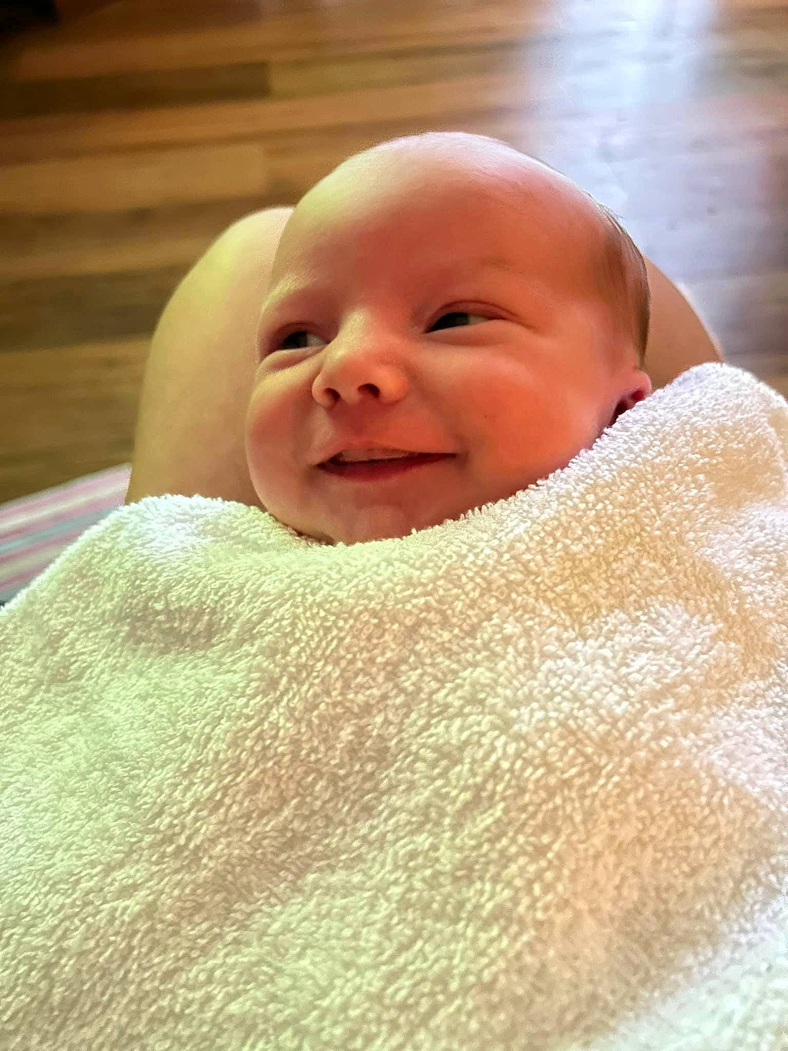 Callie is registered to the contest to win money with this photo: baby, baby_laughing, baby_toddler_clothing, cheek, child, close_up, comfort, eye, eyebrow, grass, happy, iris, laugh, linens, lip, person, skin, smile, thumb, toddler