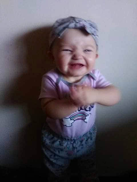 Cierra is registered to the contest to win money with this photo: arm, baby, cheek, child, chin, eye, face, facial_expression, forehead, fun, hand, head, mouth, nose, person, photograph, photography, portrait, skin, smile