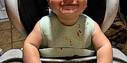 Cade joined the competition — help win amazing prizes! toddler, high_chair, messy, food, bib, smile, child, indoor, kitchen, hands, face, happy, mess, baby, plastic, tray, seat, eating, infant, young_child
