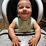 toddler, high_chair, messy, food, bib, smile, child, indoor, kitchen, hands, face, happy, mess, baby, plastic, tray, seat, eating, infant, young_child