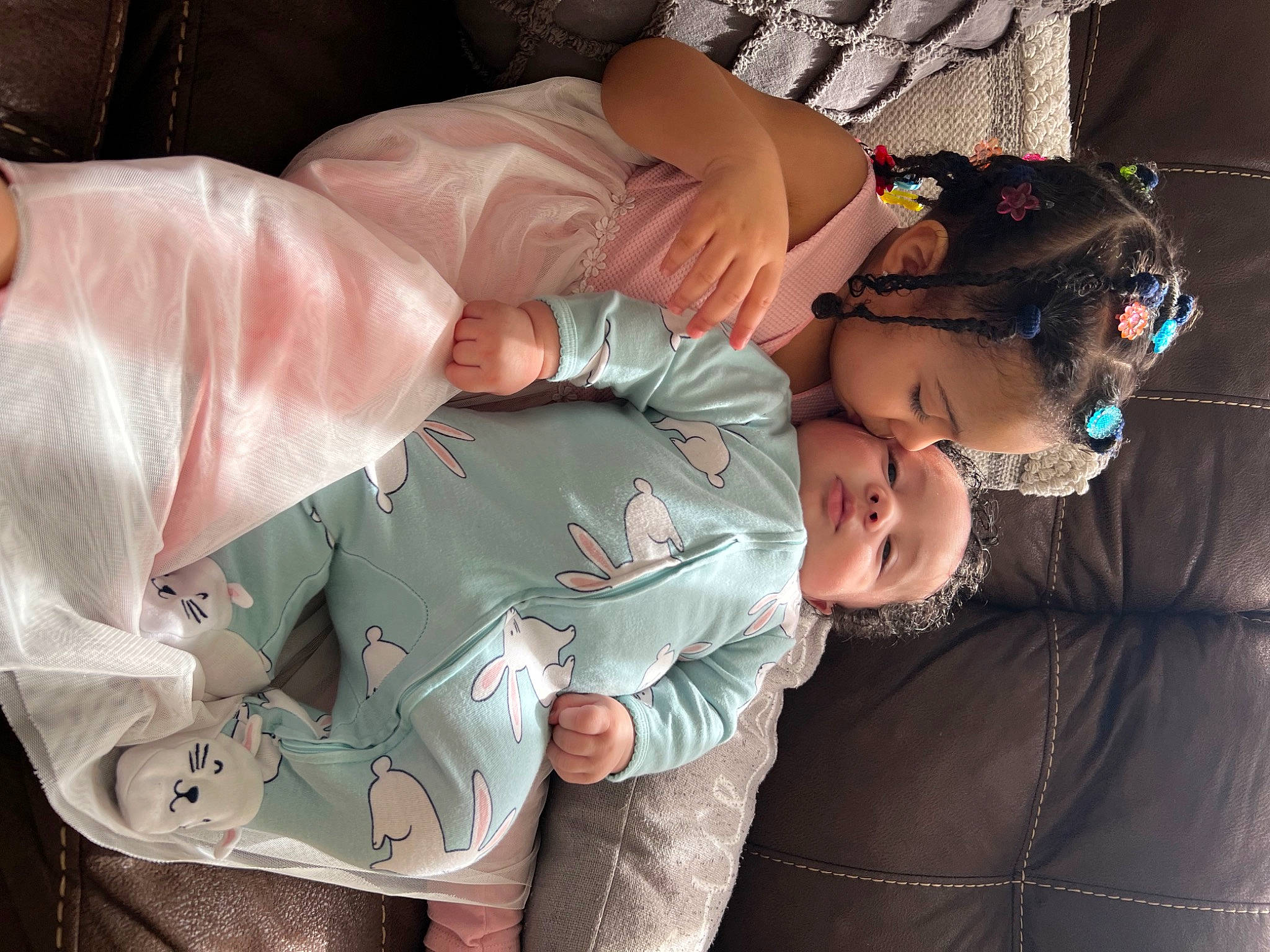 Tay is registered to the contest to win money with this photo: child, comfort, elbow, event, eyewear, facial_expression, finger, flash_photography, fun, gesture, hand, happy, jewellery, lap, love, mouth, muscle, pattern, person, sitting