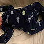 Cassiel joined the competition — help win amazing prizes! baby, newborn, sleeping, onesie, dinosaur, bed, blanket, infant, clothing, cute, peaceful, child, pajamas, footed_pajamas, indoors, rest, face, head, person, sleep