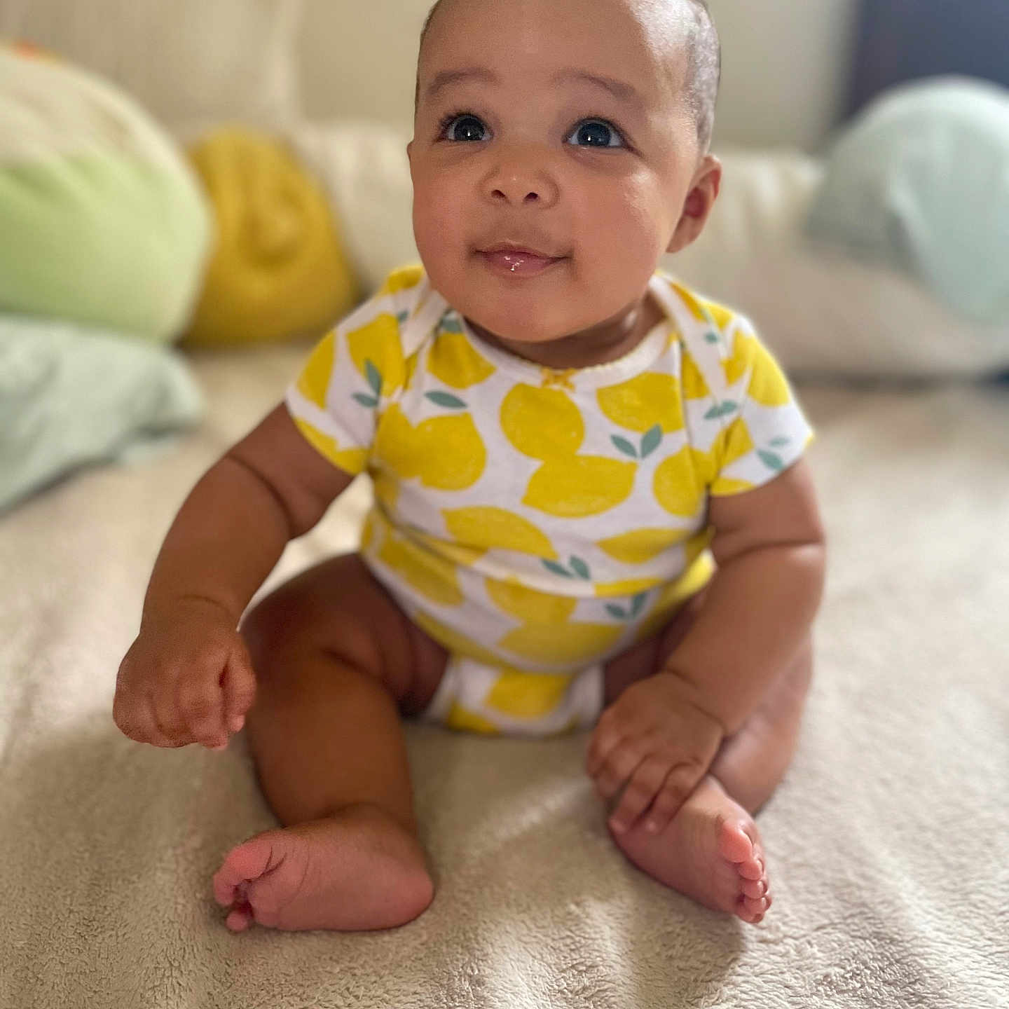 Zyla is registered to the contest to win money with this photo: baby, babycrawling, babylaughing, clothing, crawling, diaper, face, happy, head, person, photography, portrait, sitting, sleeve, smile
