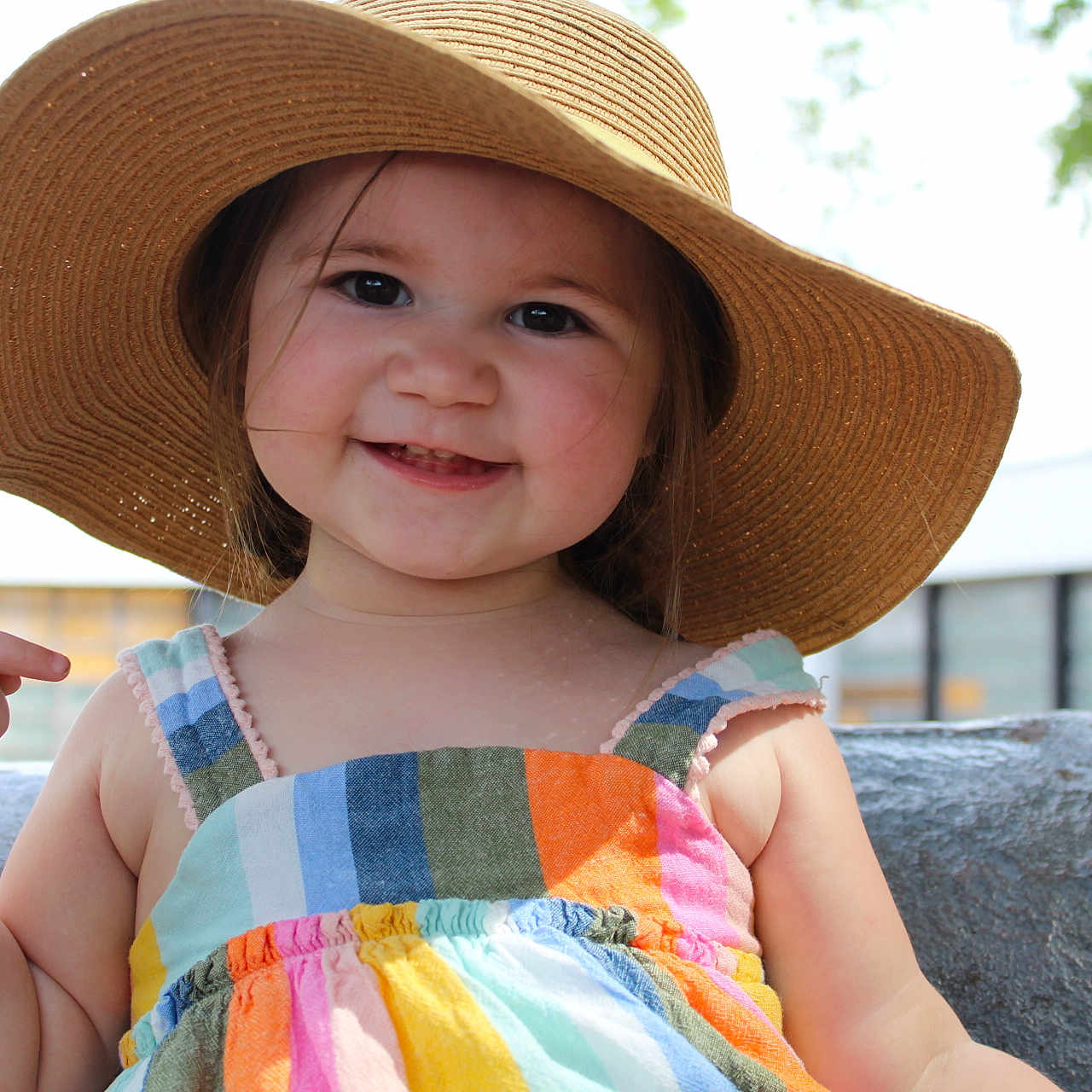Wrynne is registered to the contest to win money with this photo: baby, beachwear, bodypart, bonnet, cap, clothing, cowboyhat, dress, face, finger, hand, happy, hat, head, person, photography, portrait, smile, summer, sunhat