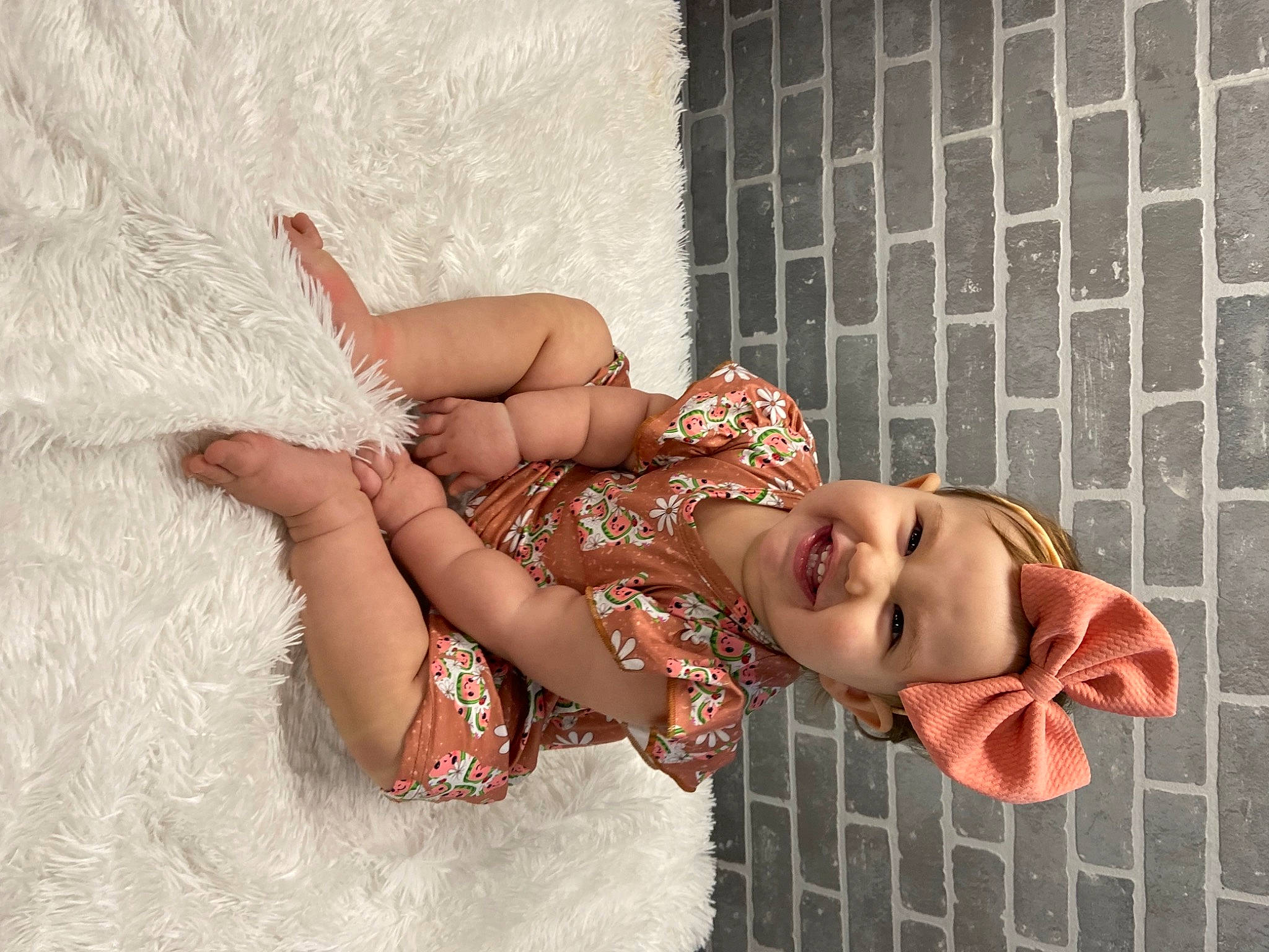 Adelyn is registered to the contest to win money with this photo: abdomen, barefoot, black_hair, chest, dress, fashion_design, happy, headgear, human_leg, joy, knee, lingerie, navel, pattern, person, smile, sunglasses, thigh, toddler, trunk