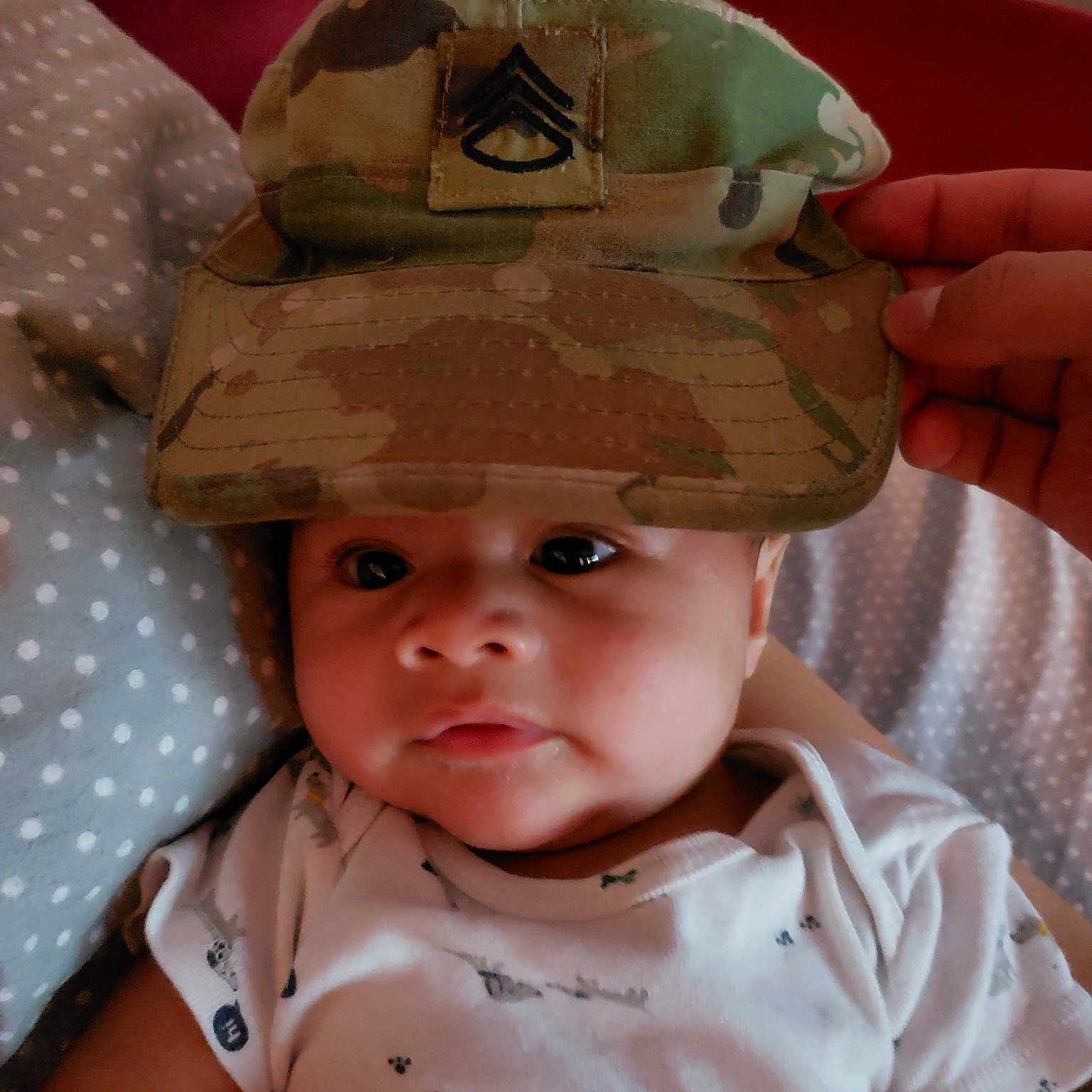 Ezequiel is registered to the contest to win money with this photo: baby, child, hat, head, headgear, person, toddler