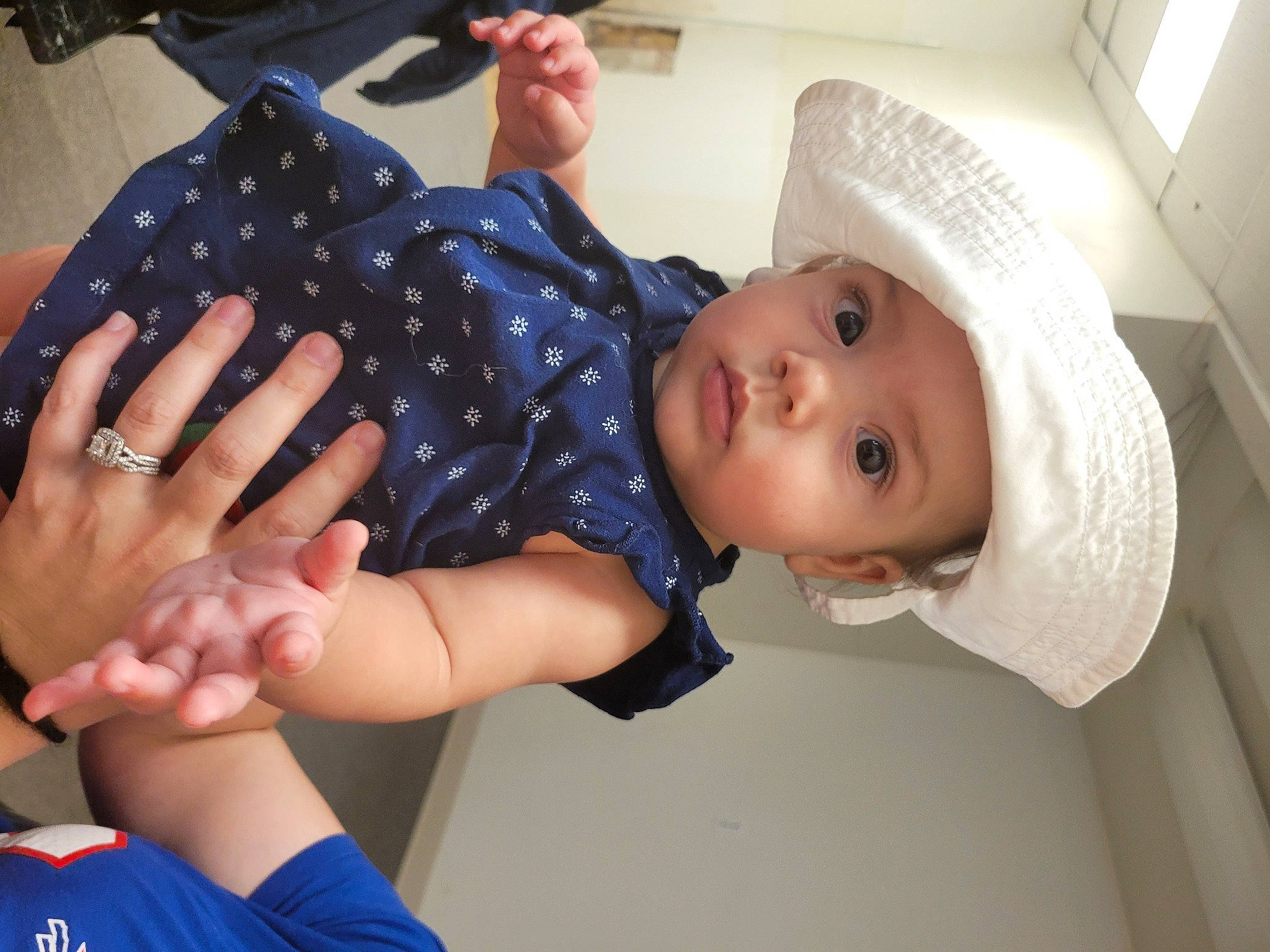 Nola joined the competition — help win amazing prizes! arm, baby, baby_products, baby_toddler_clothing, cap, child, electric_blue, face, fashion_accessory, finger, gesture, hand, hat, headwear, mouth, nail, pattern, person, sleeve, thumb