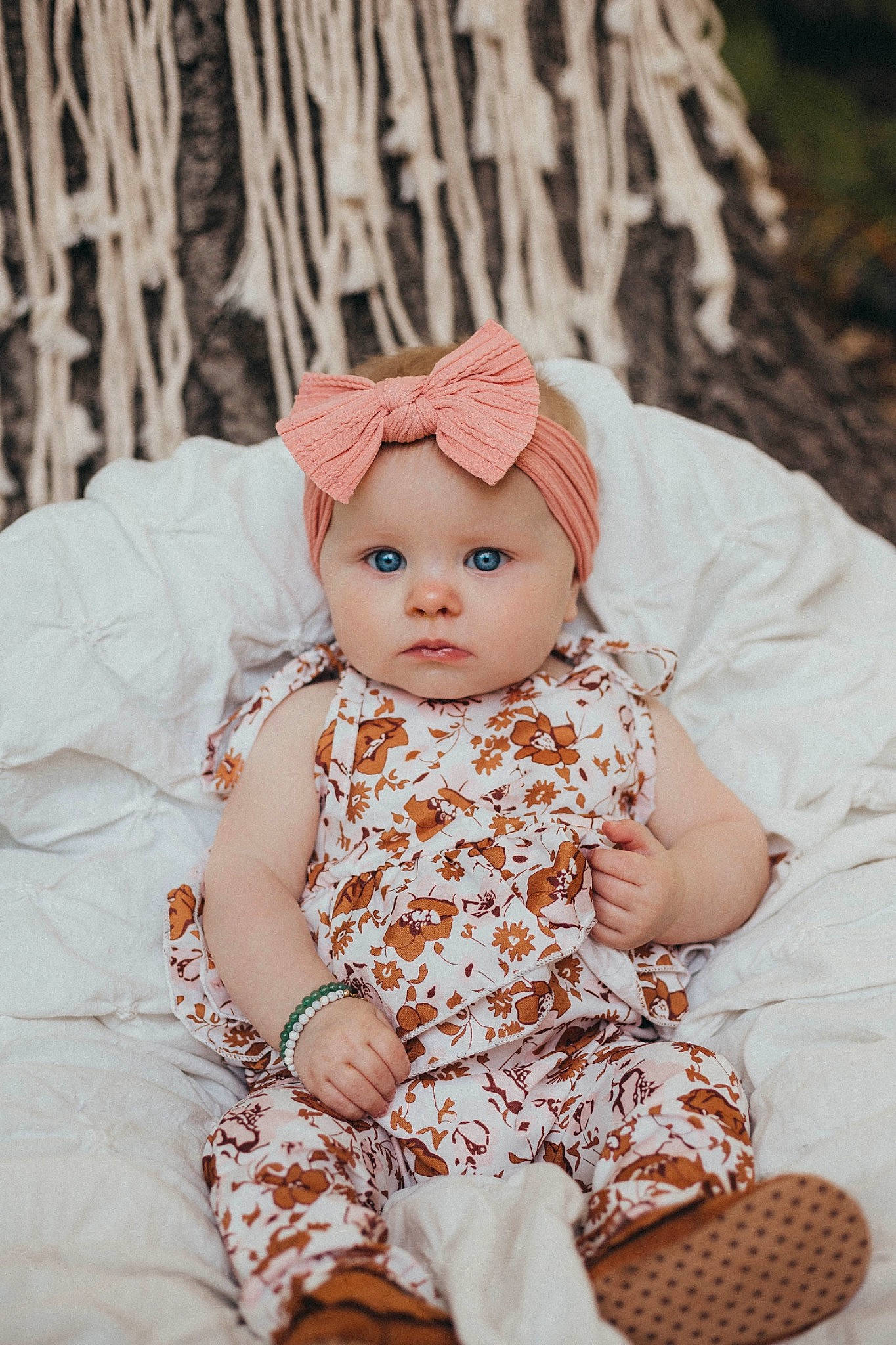 Navy is registered to the contest to win money with this photo: baby, baby_toddler_clothing, cap, cheek, child, doll, embellishment, eye, grass, head, headwear, iris, knit_cap, lip, pattern, peach, person, pink, skin, sleeve