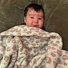 baby, infant, child, portrait, smiling, happy, face, eyes, hair, blanket, fleece, pink, patterned, couch, indoor, sitting, cozy, closeup, photography, home
