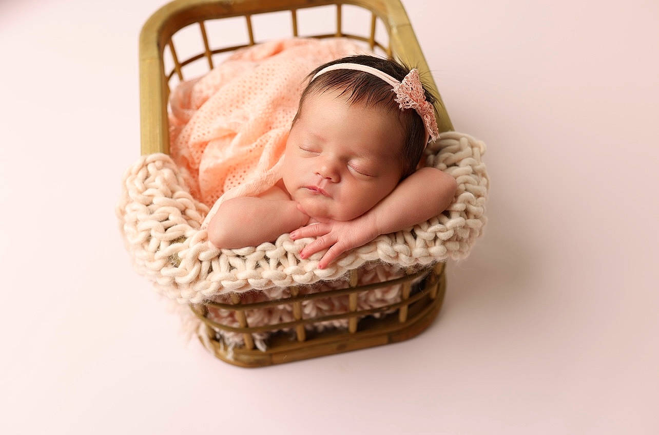 Charlee joined the competition — help win amazing prizes! arm, baby, baby_products, baby_safety, baby_sleeping, baby_toddler_clothing, baby_toys, basket, chair, comfort, eye, fashion_accessory, hair_accessory, infant_bed, person, portrait_photography, sitting, storage_basket, toddler, wicker