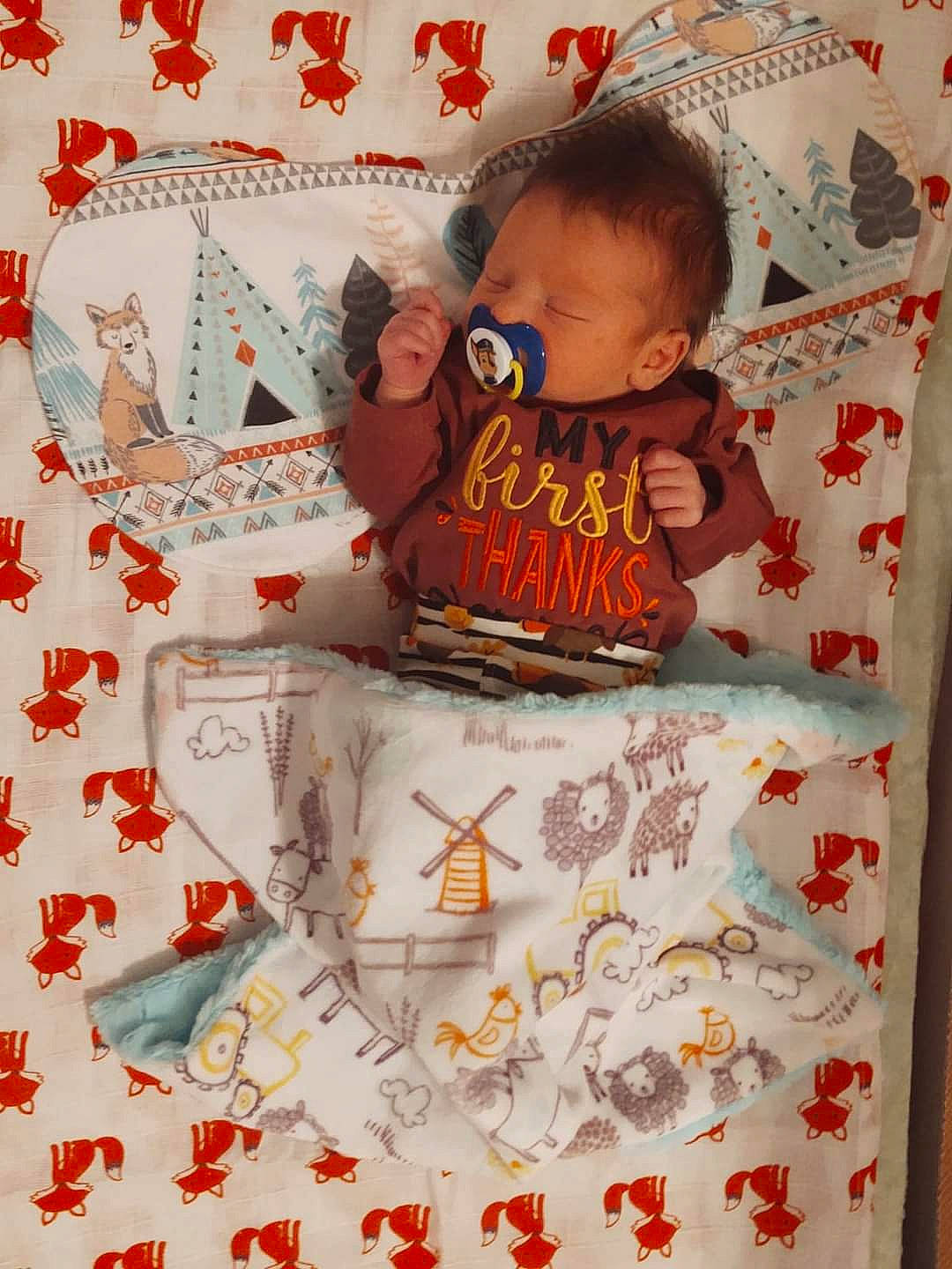 Darrell is registered to the contest to win money with this photo: baby, baby_products, baby_toddler_clothing, bedding, birthday_party, child, event, font, linens, orange, pattern, person, pink, red, room, sleeve, sweetness, t_shirt, textile, toddler