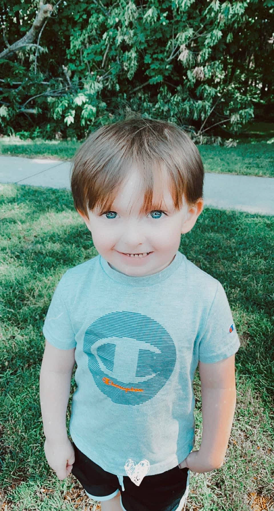 Christian joined the competition — help win amazing prizes! aqua, baby_toddler_clothing, chin, clothing, cool, eye, grass, green, happy, head, human_body, joy, people_in_nature, person, plant, sleeve, smile, standing, summer, t_shirt