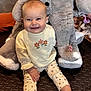 Stella a rejoint le concours — aidez-le/la à gagner de superbes lots ! baby, child, smiling, sitting, plush_elephant, toy, floor_mat, indoor, clothing, sweatshirt, pants, barefoot, cute, happy, playtime, home, infant, childrens_toy, furniture, cozy