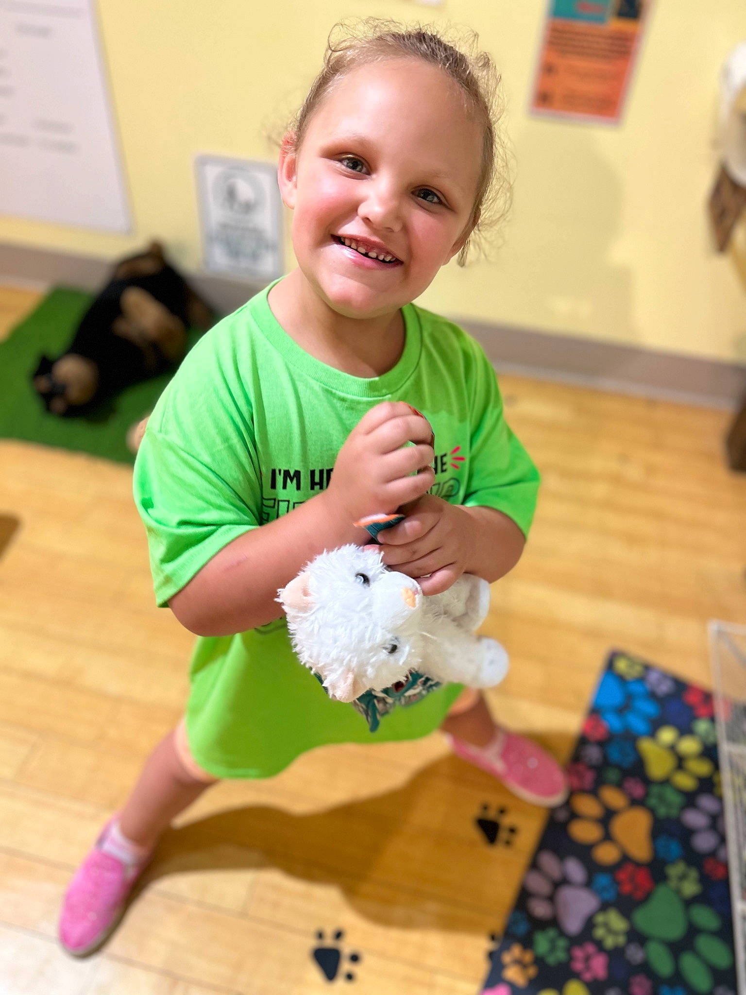 Allie is registered to the contest to win money with this photo: baby, baby_toddler_clothing, child, event, flooring, fun, happy, hardwood, joy, party, pattern, person, play, room, sleeve, smile, sock, stuffed_toy, t_shirt, toddler